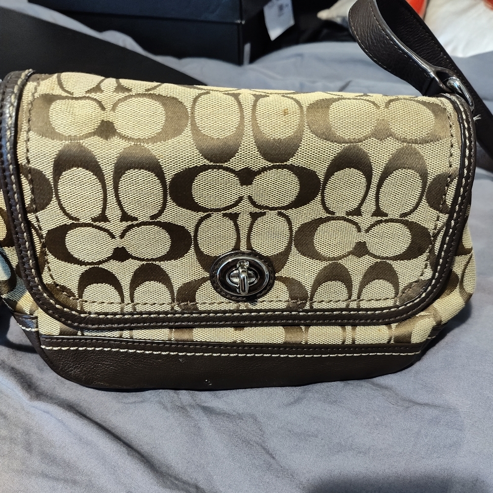 Brown Coach with imperfections